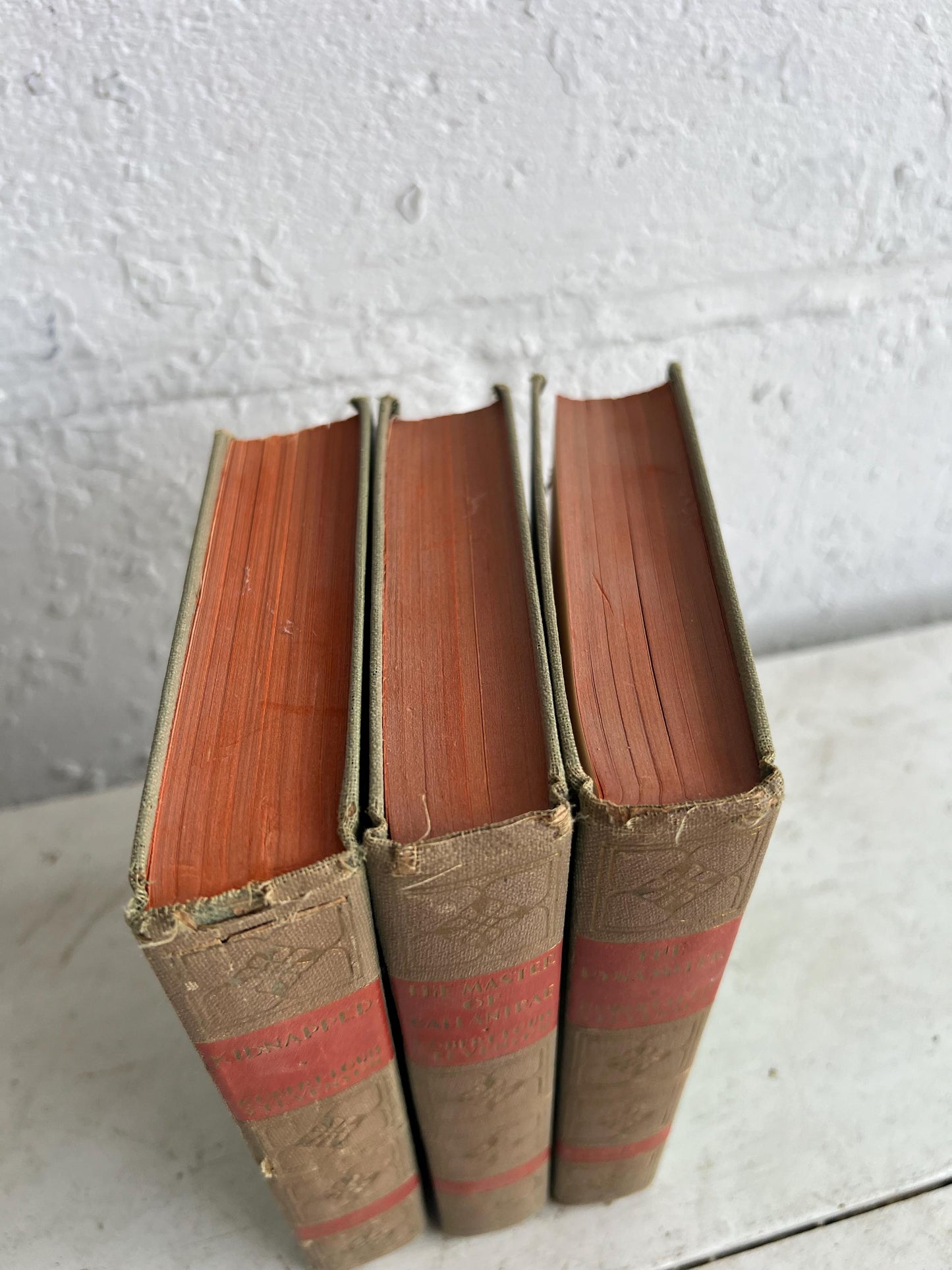 VINTAGE BOOK STACK | vintage green with red & gold accents, Robert Louis Stevenson, table styling, old books, coffee table books