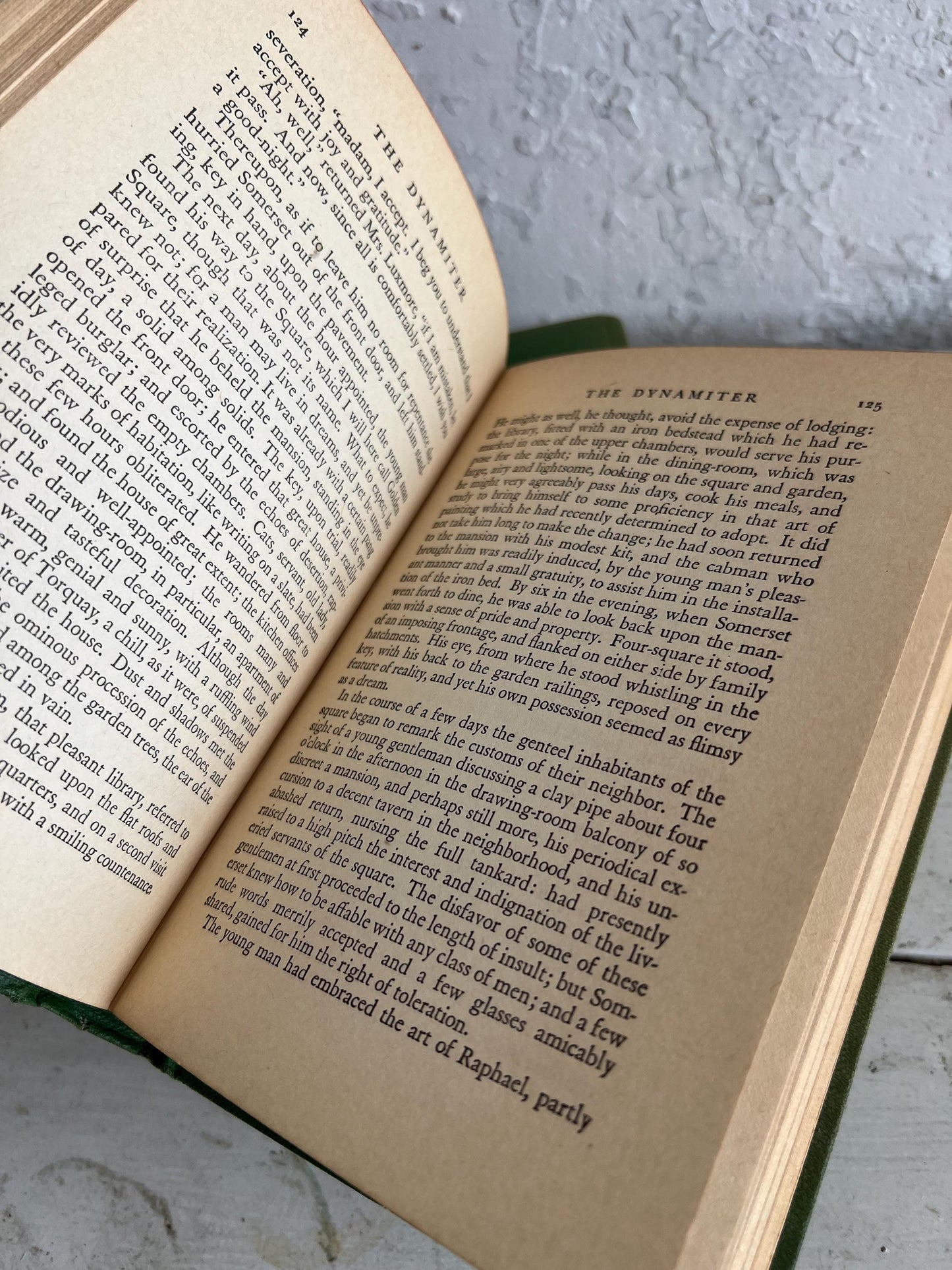 VINTAGE BOOK STACK | vintage green with red & gold accents, Robert Louis Stevenson, table styling, old books, coffee table books