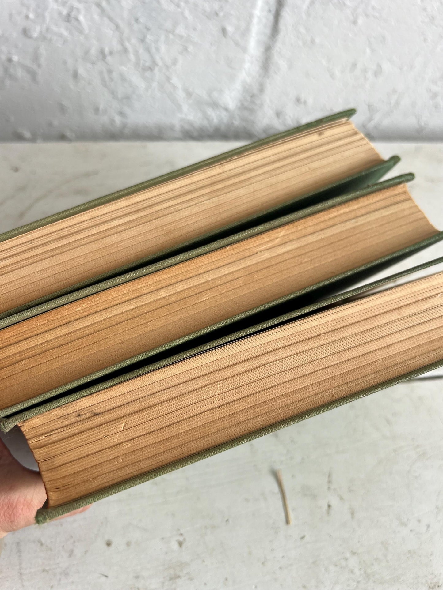 VINTAGE BOOK STACK | vintage green with red & gold accents, Robert Louis Stevenson, table styling, old books, coffee table books